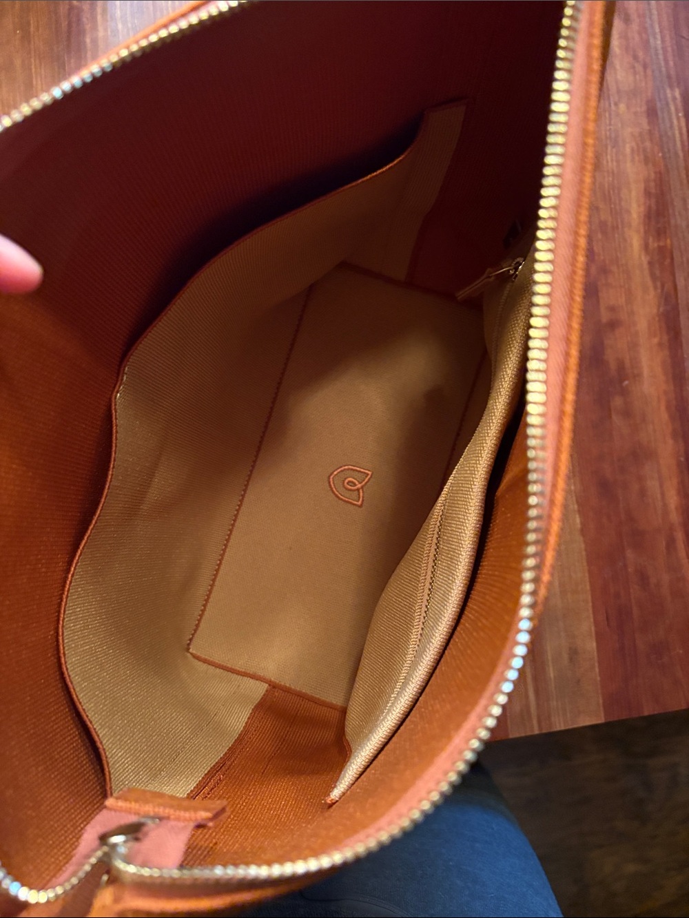 Rothy’s Mini Zip Bucket Bag, in burnt orange, like new - Picture 6 of 7